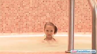 Paris Milan, A Young Teen, Provocatively Wearing A Bikini While Enjoying A Jacuzzi