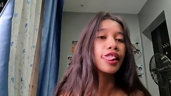 A Petite Asian Girl With A Slender Body